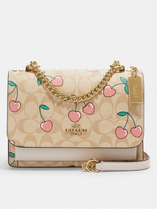 Coach Handbags - EUC Coach Klare Crossbody In Signature Canvas With Heart Cherry Print